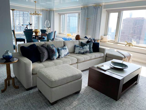 a finely appointend interior design of a high rise condo living room