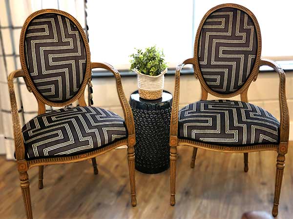 two upholstred dining room chairs