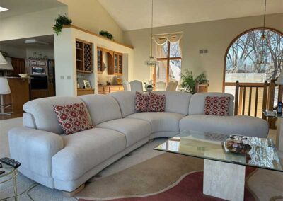 white upholstered section in a living room